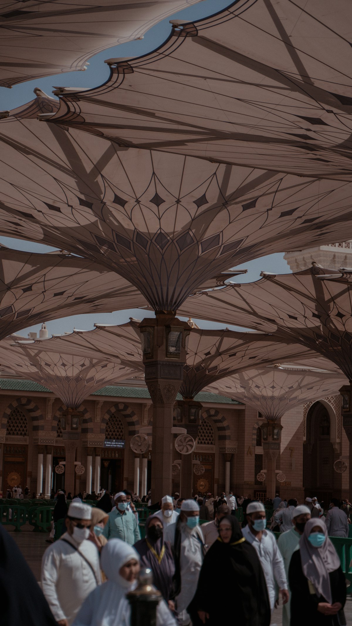 Visitors and worshippers in the courtyard of the Prophet’s Mosque
